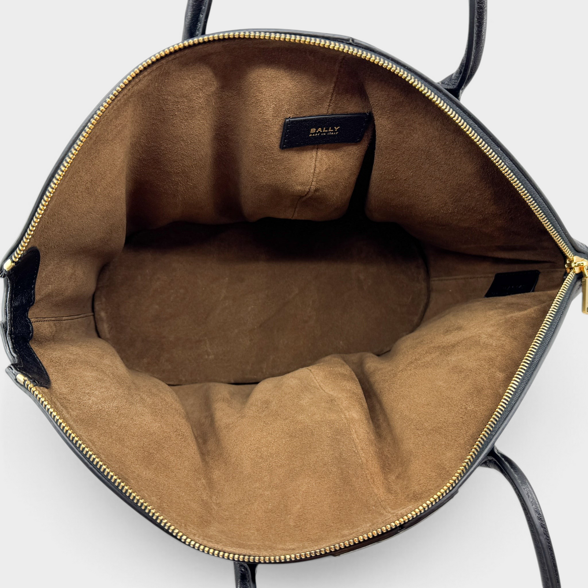 Studio61 Preloved Boutique Sydney Bally Belle Alpine tote bag interior featuring brown suede lining and gold logo tag