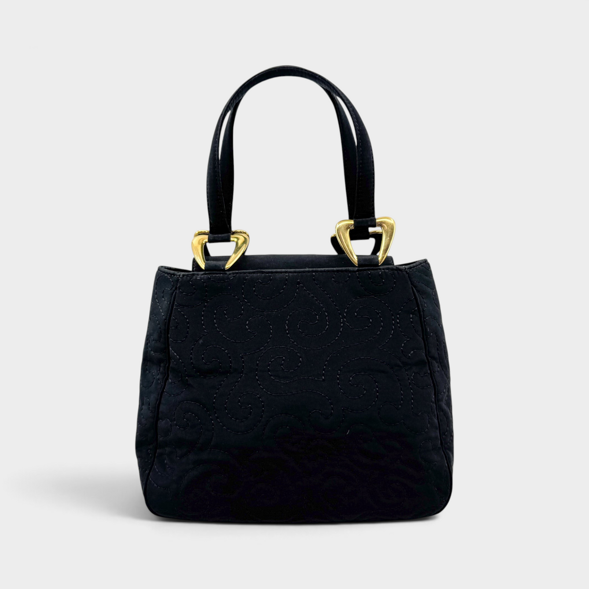 Studio61 Preloved Boutique Sydney vintage Yves Saint Laurent black quilted fabric evening bag with gold hardware