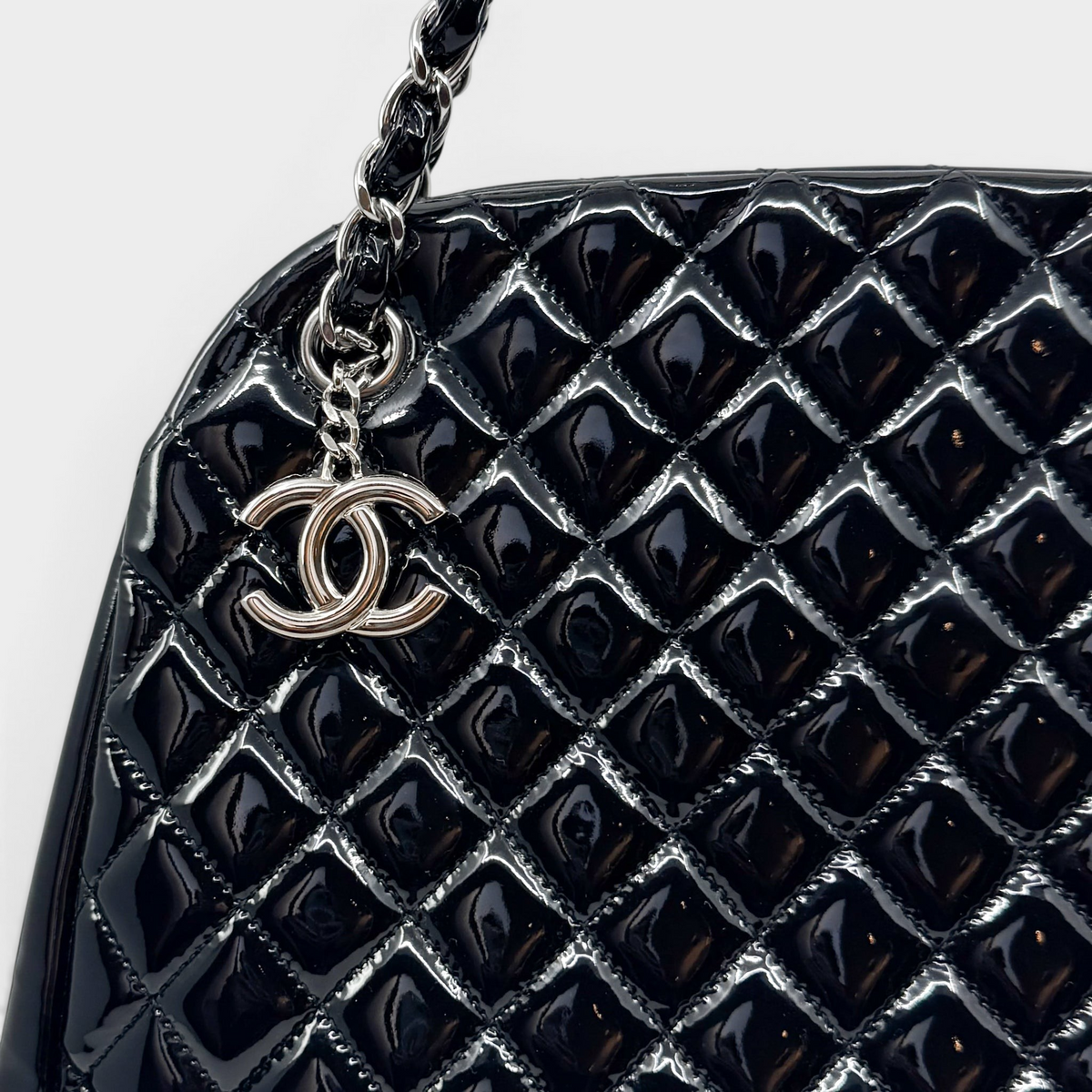 Studio61 Preloved Boutique Sydney Chanel black quilted patent leather Just Mademoiselle bag with silver CC charm