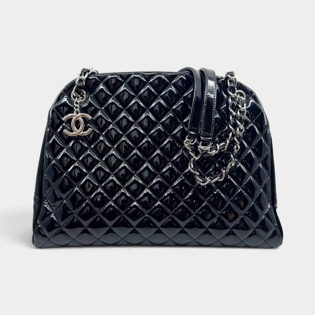 Studio61 Preloved Boutique Sydney Chanel black quilted patent leather Just Mademoiselle bowling bag with silver hardware.