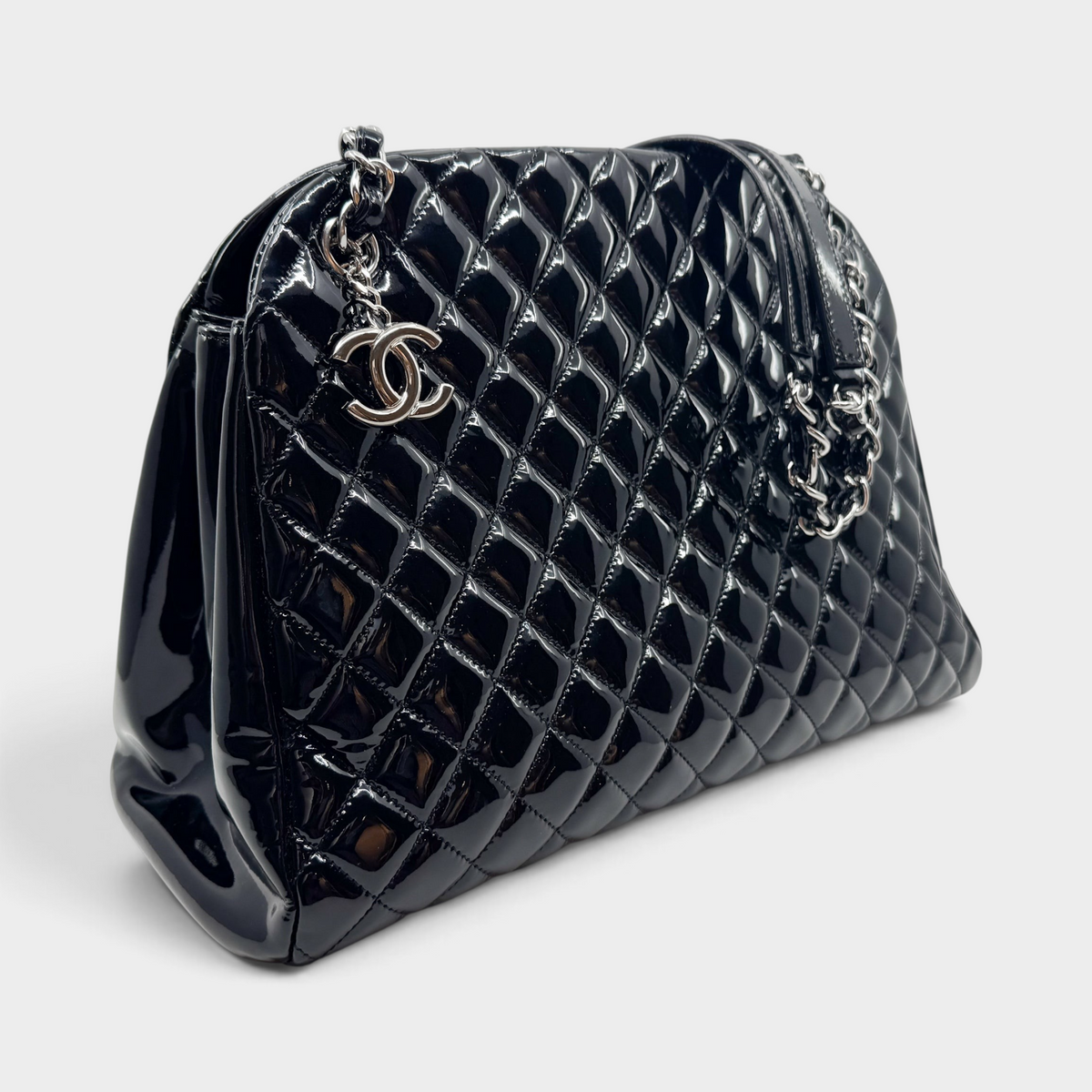 Studio61 Preloved Boutique Sydney Chanel Just Mademoiselle black quilted patent leather bowling bag with silver hardware