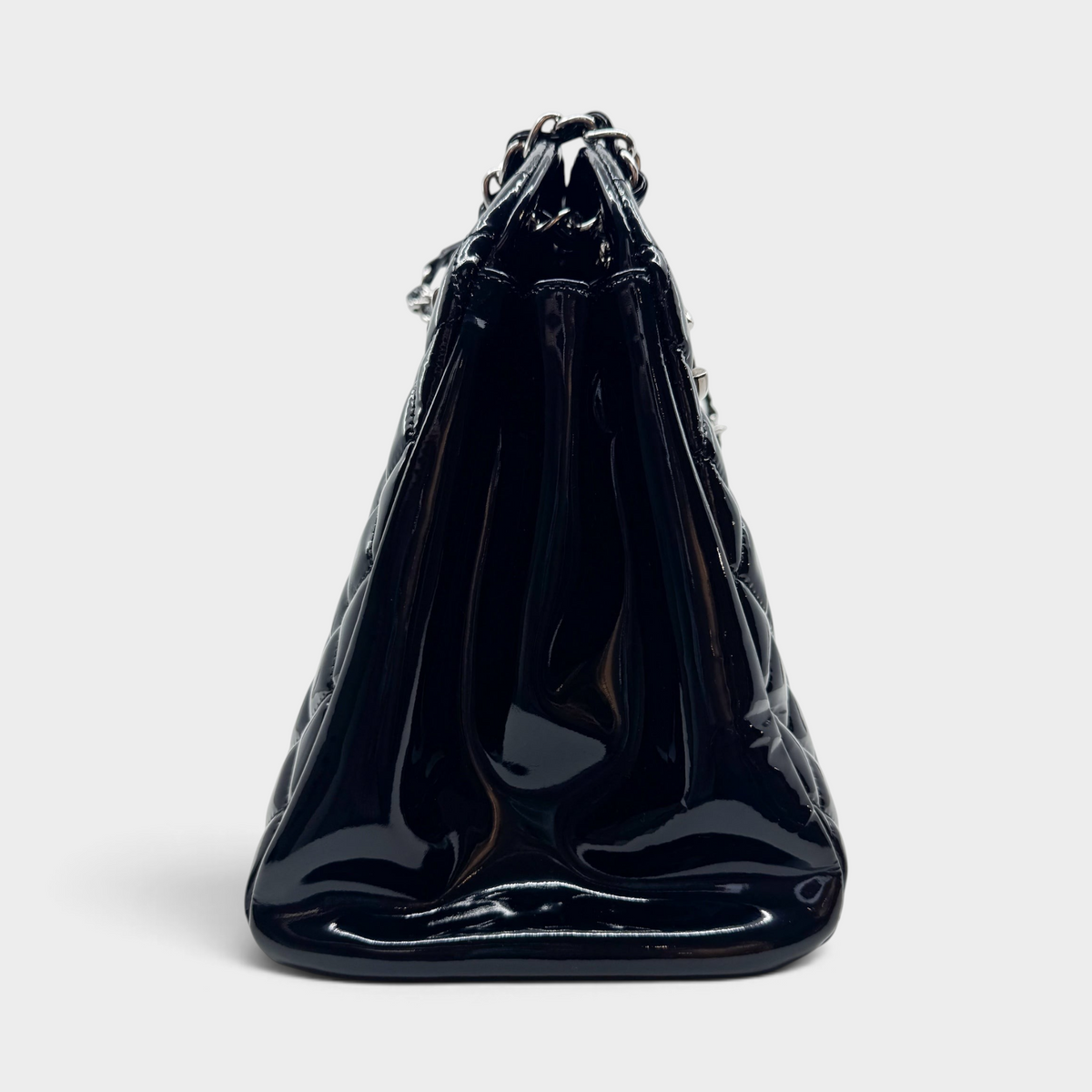 Studio61 Preloved Boutique Sydney Chanel Just Mademoiselle black quilted patent leather bowling bag side view