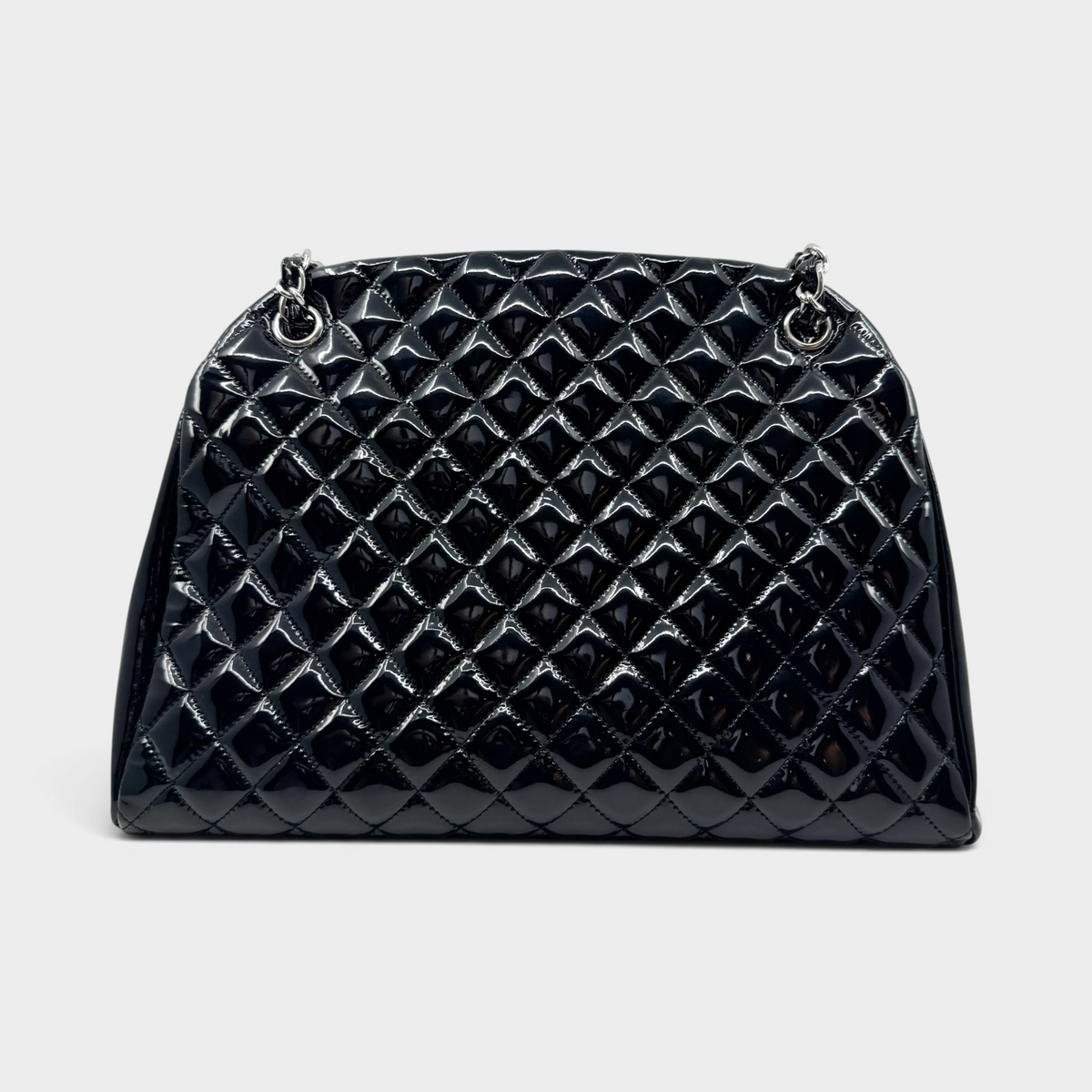 Studio61 Preloved Boutique Sydney Chanel black quilted patent leather Just Mademoiselle bowling bag with silver hardware.