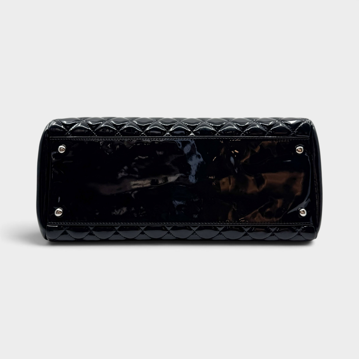 Studio61 Preloved Boutique Sydney Chanel black quilted patent leather bowling bag base with silver-tone protective feet