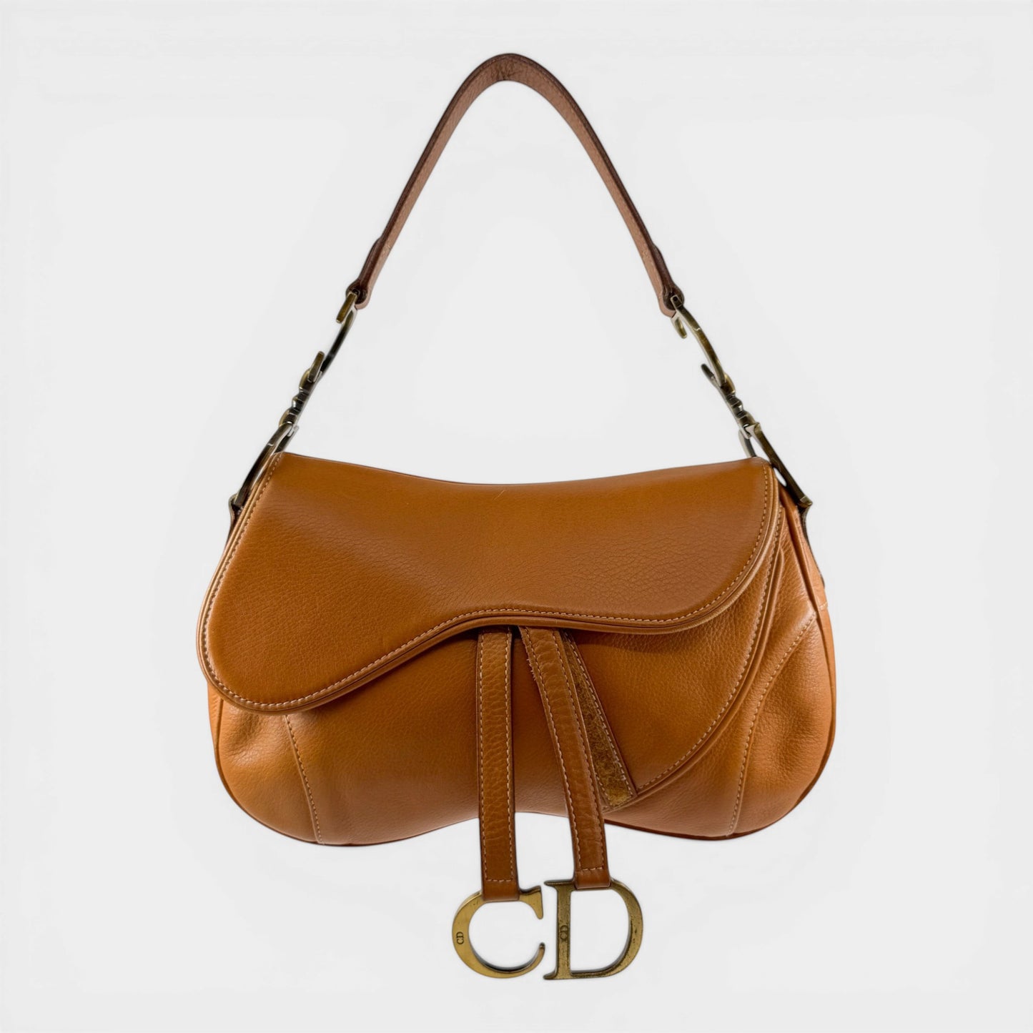 Studio61 Preloved Boutique Sydney Christian Dior tan leather vintage Y2K double Saddle Bag with CD hardware.