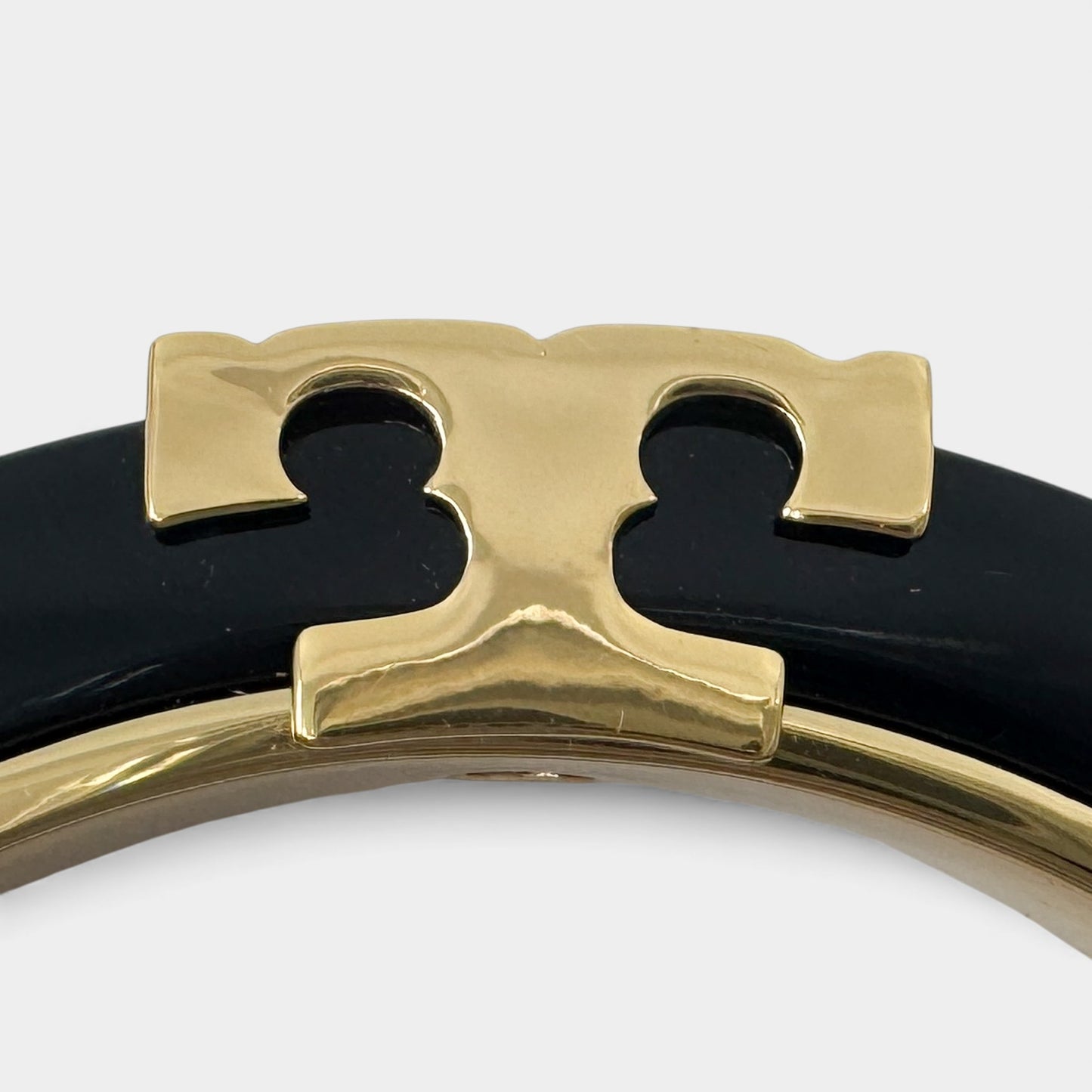 Tory Burch Black Enamel & Gold Tone Metal Bracelet Bangle